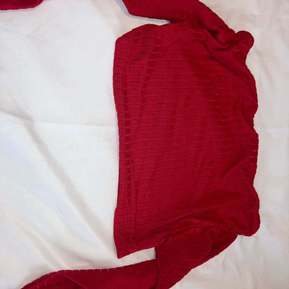 Cute red tube top that ties in the back to ensure that you don’t get a nip slip